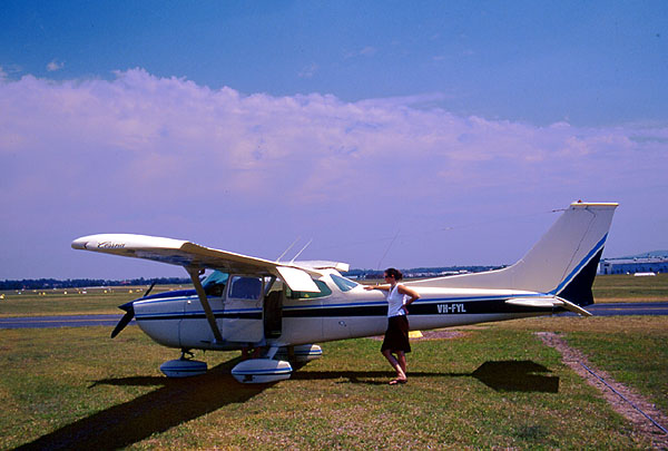 Jane checking out the plane - Archerfield - Brisbane 
<br>
Photo: Robert Downie - 2002 (EOS 300)