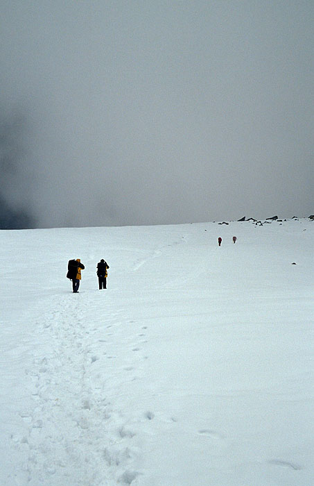 Crossing the glacier on the Cho La (Chhugyuma) pass (5420m) - Our guides Hari and Saroj in the foreground.
<br>
Photo: Robert Downie - 2004 (EOS 300)