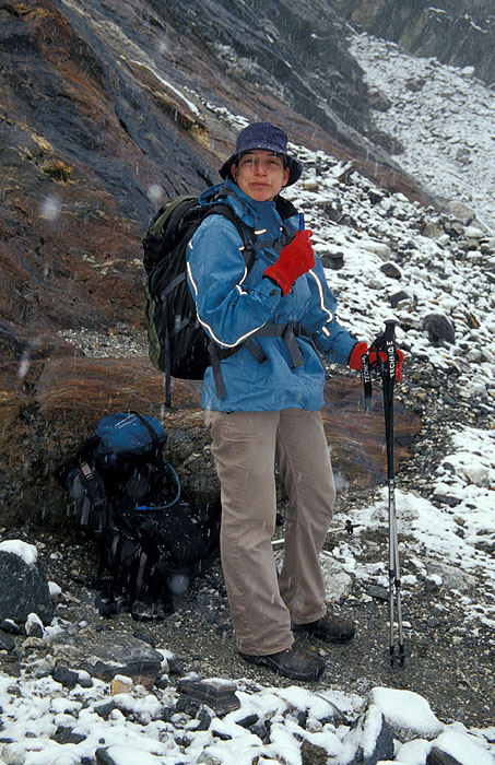 Ady taking a rest on the way up to the Cho La (Chhugyuma) pass (5420m) 
<br>
Photo: Robert Downie - 2004 (EOS 300)