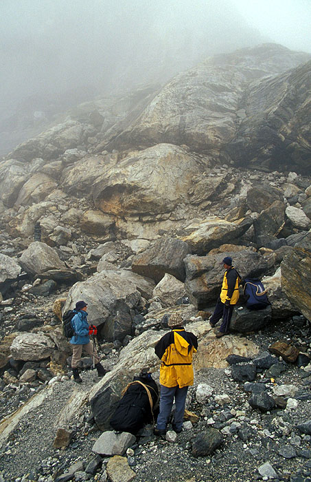 Ady,  with our guides Hari and Saroj coming down the Dzonglha side of the Cho (Chhugyuma) La  pass.
<br>
Photo: Robert Downie - 2004 (EOS 300)