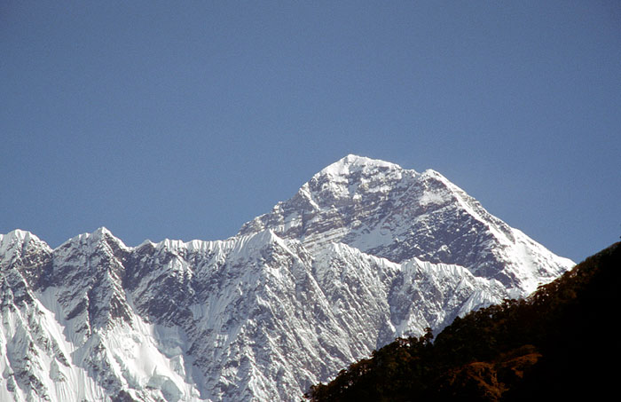 Everest (8850m) as seen from the trail up to Namche Bazaar from the Larja Bridge
<br>
Photo: Robert Downie - 2004 (EOS 300)
