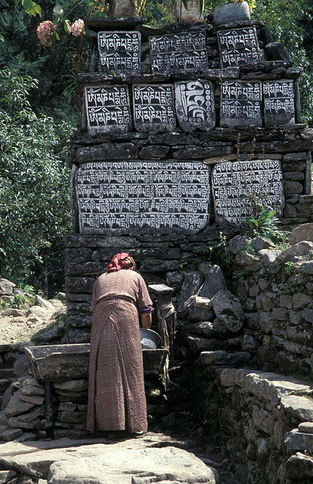 Lady cleaning up her dishes
<br>
Photo: Robert Downie - 2004 (EOS 300)