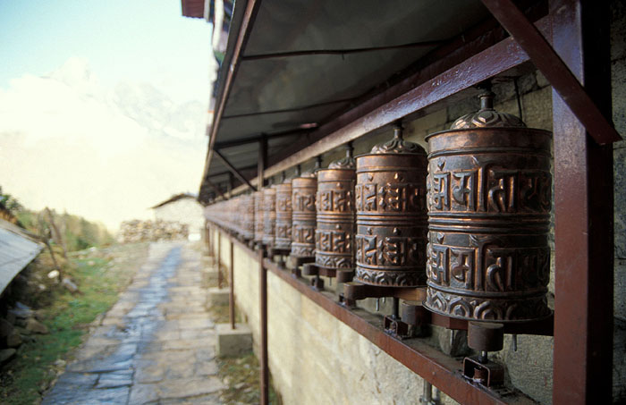 Prayer wheels -  Tengboche Monastery  
<br>
Photo: Robert Downie - 2004 (EOS 300)