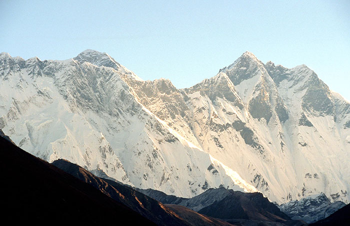 The great wall of Nuptse (7879m) on the left and South face of Lhotse (8501m) on the right.  Mt Everest (8850m) is peaking over the top of Nuptse - Tengboche
<br>
Photo: Robert Downie - 2004 (EOS 300)