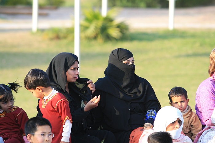 Pakistani women watch on in a segregated part of the crowd - Wagah Border
<br>
Photo: Robert Downie - Feb 2007 (EOS 400D)