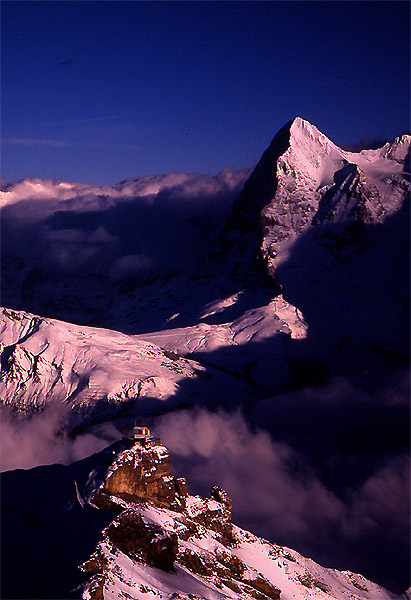 Looking back across towards the Eiger (3970m), from the Schilthorn (2971m)
<br>
You can see the small hut of the cable station at Birg (2676m) in the foreground
<br>
Photo: Robert Downie - January 2002 (EOS 300) 