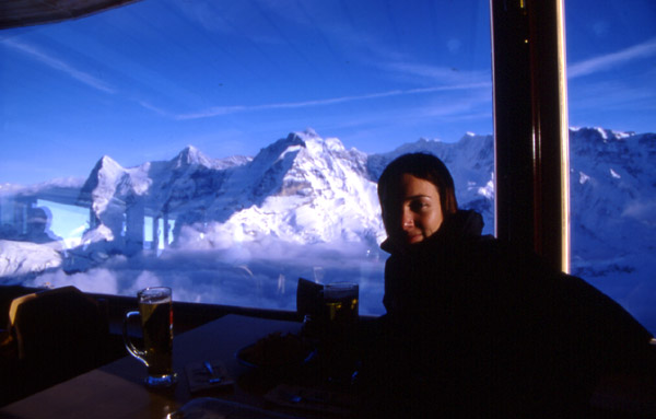 Huge beers -  Huge mountains -  what more do you want??? - Shilthorn (2971m) 
<br>
Eiger, M�nch and Jungfrau out the window of the revolving restaurant.  The view revolves a complete cycle every 20 or so minutes
<br>
Photo: Robert Downie - January 2002 (EOS 300) 