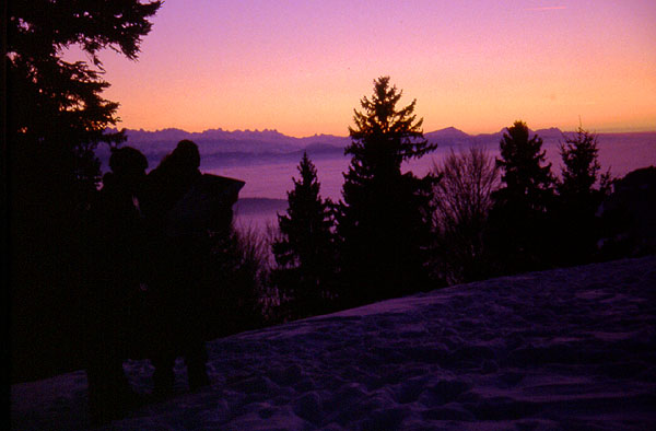 Thomas checking the map in the last few rays of light
<br>
Sunset on the walk out - Toesstal
<br>
Photo: Robert Downie  - January 2002 (EOS 300) 