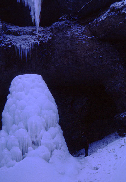Ady investigating the bottom half of a frozen waterfall - Toesstal
<br>
Photo: Robert Downie  - January 2002 (EOS 300) 