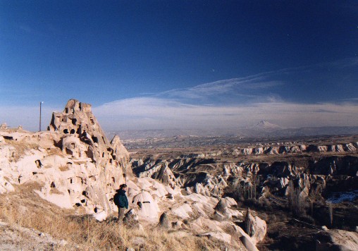 Lookoung out from U�hishar Belediyesi Kalesi over Cappadocia.  The high peak of Erciyes Da?i in the far off distance (3916m)
<br>
Photo: Robert Downie - January 2001 (EOS 300)
