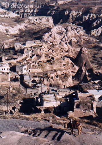 Looking towards the small village of U�hishar from the U�hishar Belediyesi Kalesi (Rock Citadel)
<br>
Photo: Robert Downie - January 2001 (EOS 300)