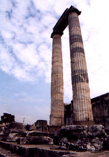 Myself standing at the base of one of the columns.  Gives an idea of the size when I am smaller then the base plate.
<br>
Temple of Apollo (Circa 4th Century BC).  Didyma.  
<br>
Photo: Robert Downie - January 2001 (EOS 300)