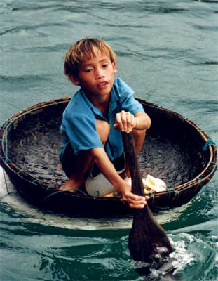 Small boy on a island off Na Trang
<br>
Photo: Robert Downie - December 1998 (EOS IX) 