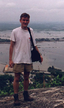 Picture of myself  on  the summit of Sam Mountain with Cambodia in the background.
<br>
Photo: Unknown Photographer - December 1998 (EOS IX) 